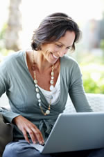 Happy Woman Working on Computer