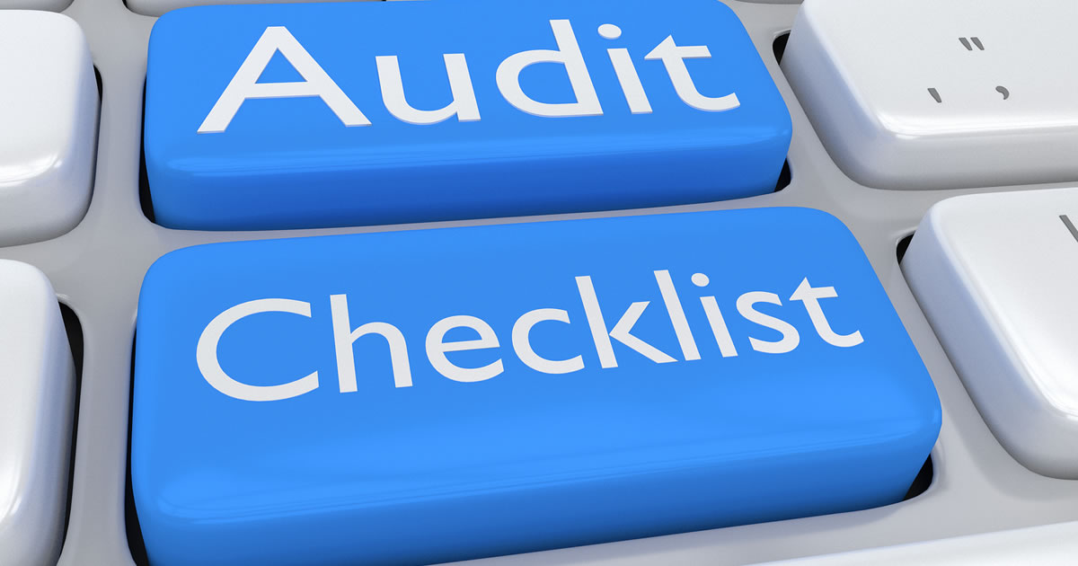 3D illustration of computer keyboard with the text "Audit Checklist" on two adjacent pale blue buttons