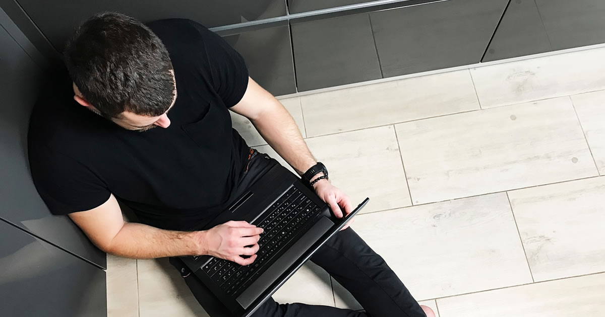 Man working at home on laptop