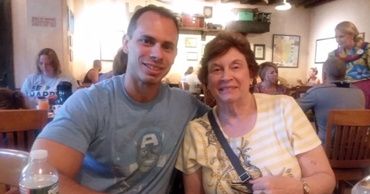 Photo of copywriter Tim Matassa and his mom enjoying breakfast at Animal Kingdom last summer on a family trip to Walt Disney World in Florida