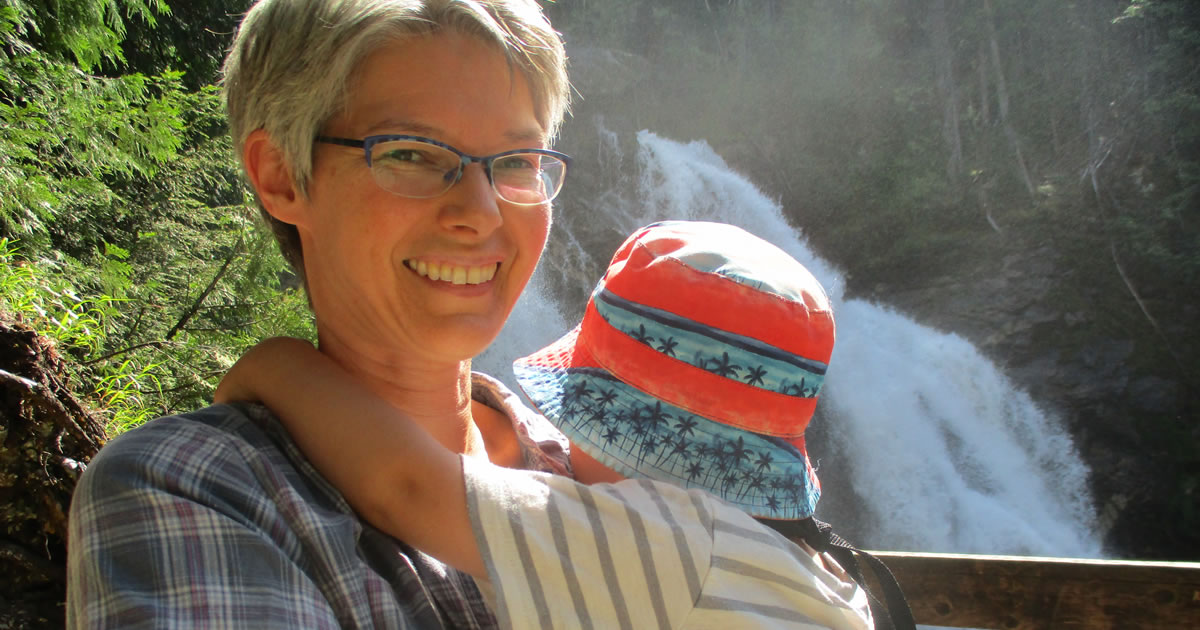 Photo of writer Zoe Blarowski and her son by Rainbow Falls