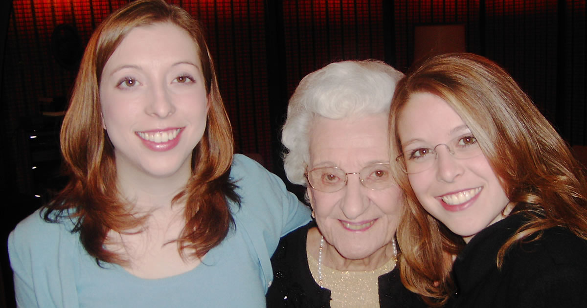 Two smiling female writers and their proud great grandmother