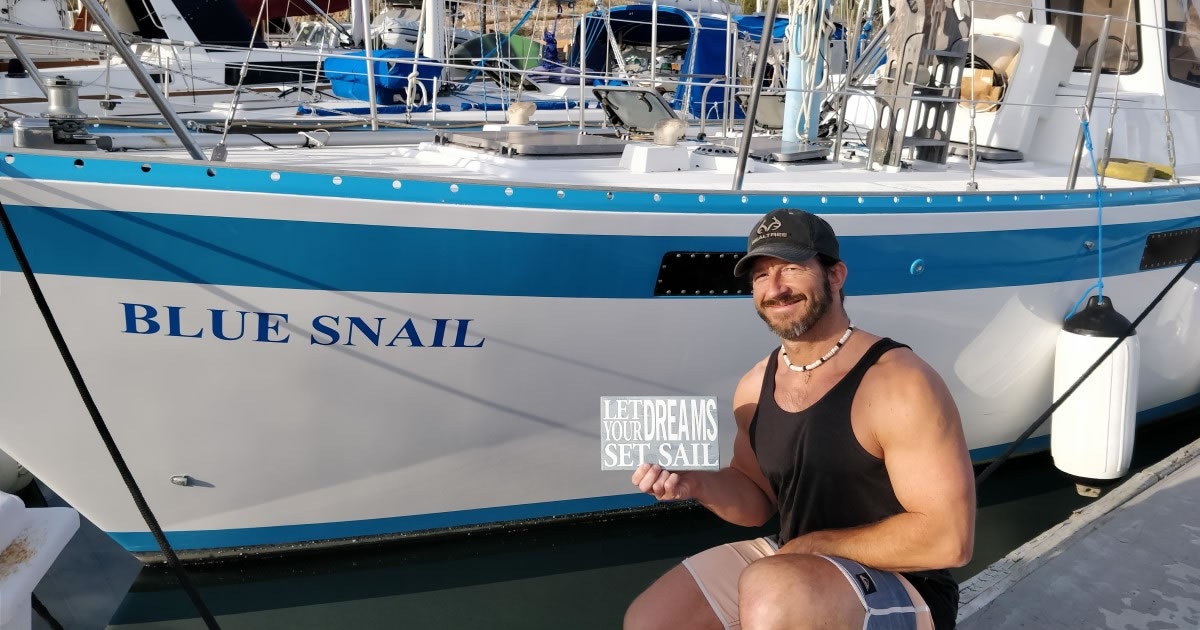 Copywriter Keith Trimels with his sailboat