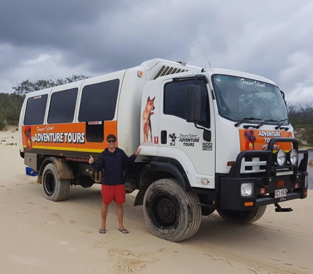 Writer Jason Gaspero exploring Fraser Island, Australia in a purpose-built 4WD vehicle