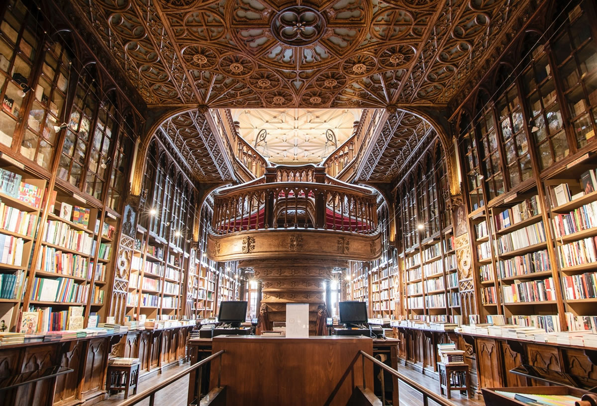 an elegant old library with numerous books on shelves