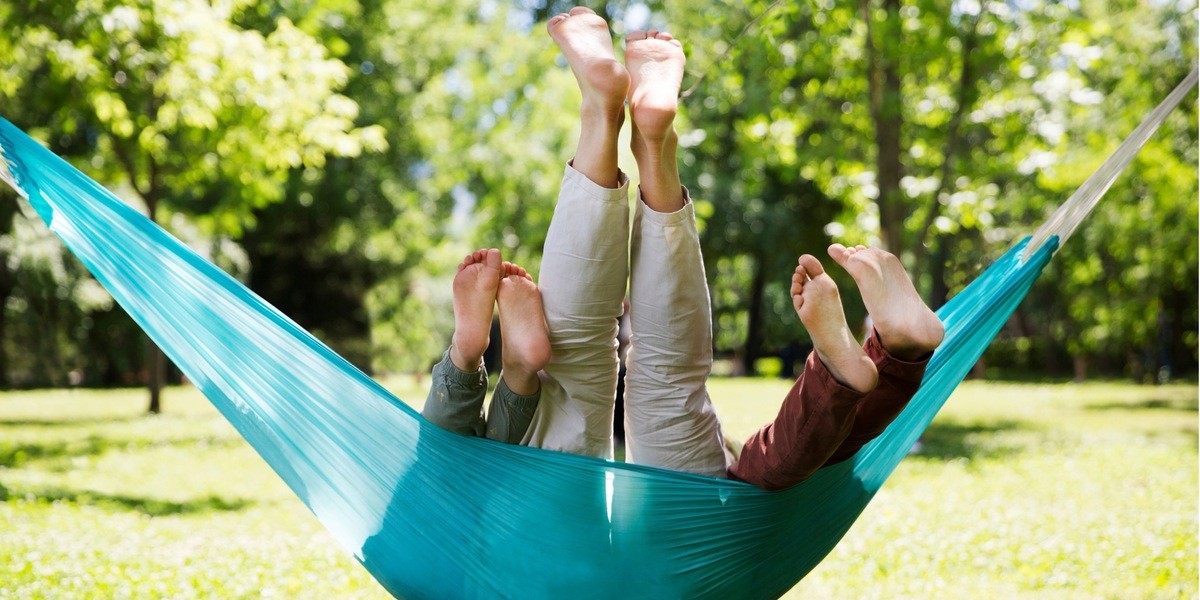 Family in hammock with feet sticking out