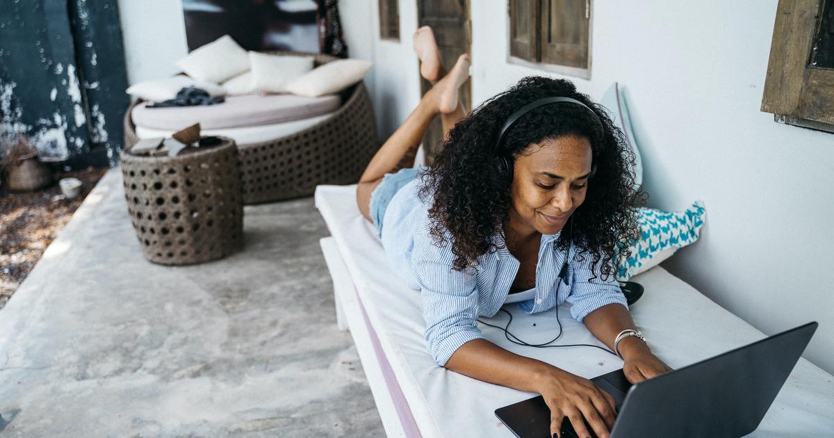 Woman typing on a laptop