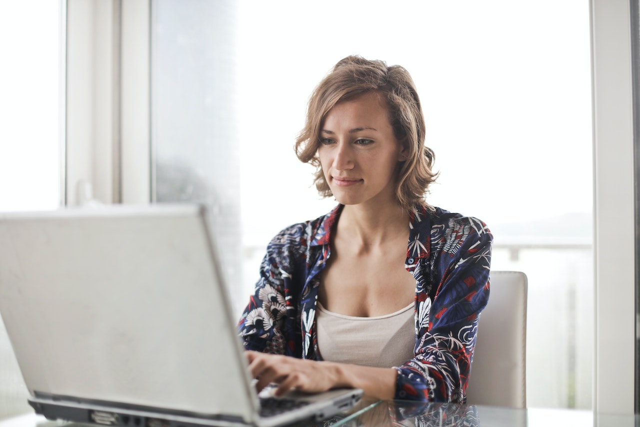 female writer working on computer