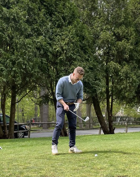 Writer Chad Myers playing golf