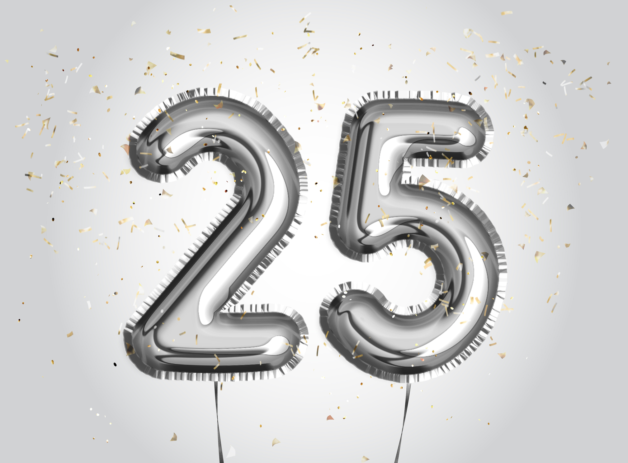 Numerals 25 in silver balloons with confetti