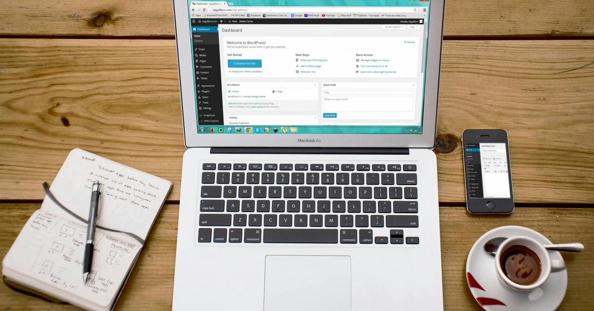 Image of a laptop with a blogging platform on screen
