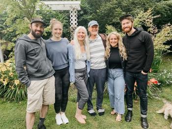 Writer Cheryl Malcham and her husband with their kids and their spouses