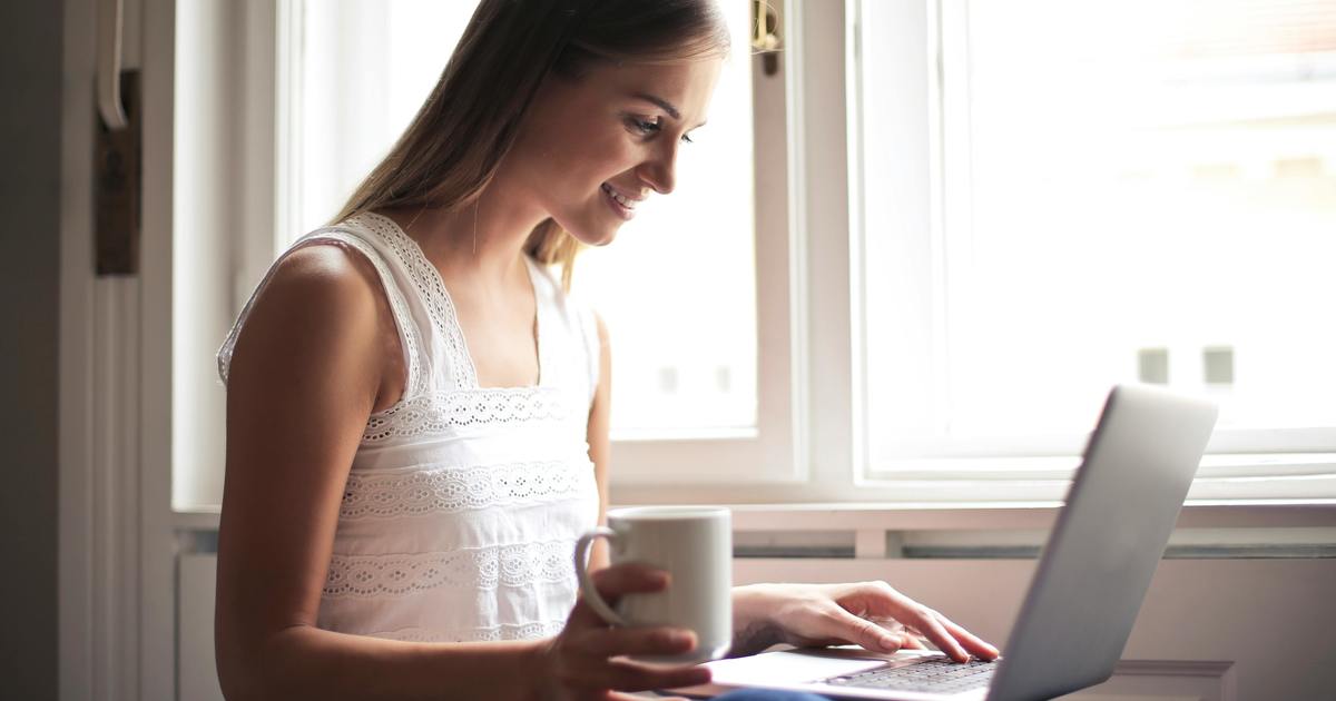 Writer typing on laptop