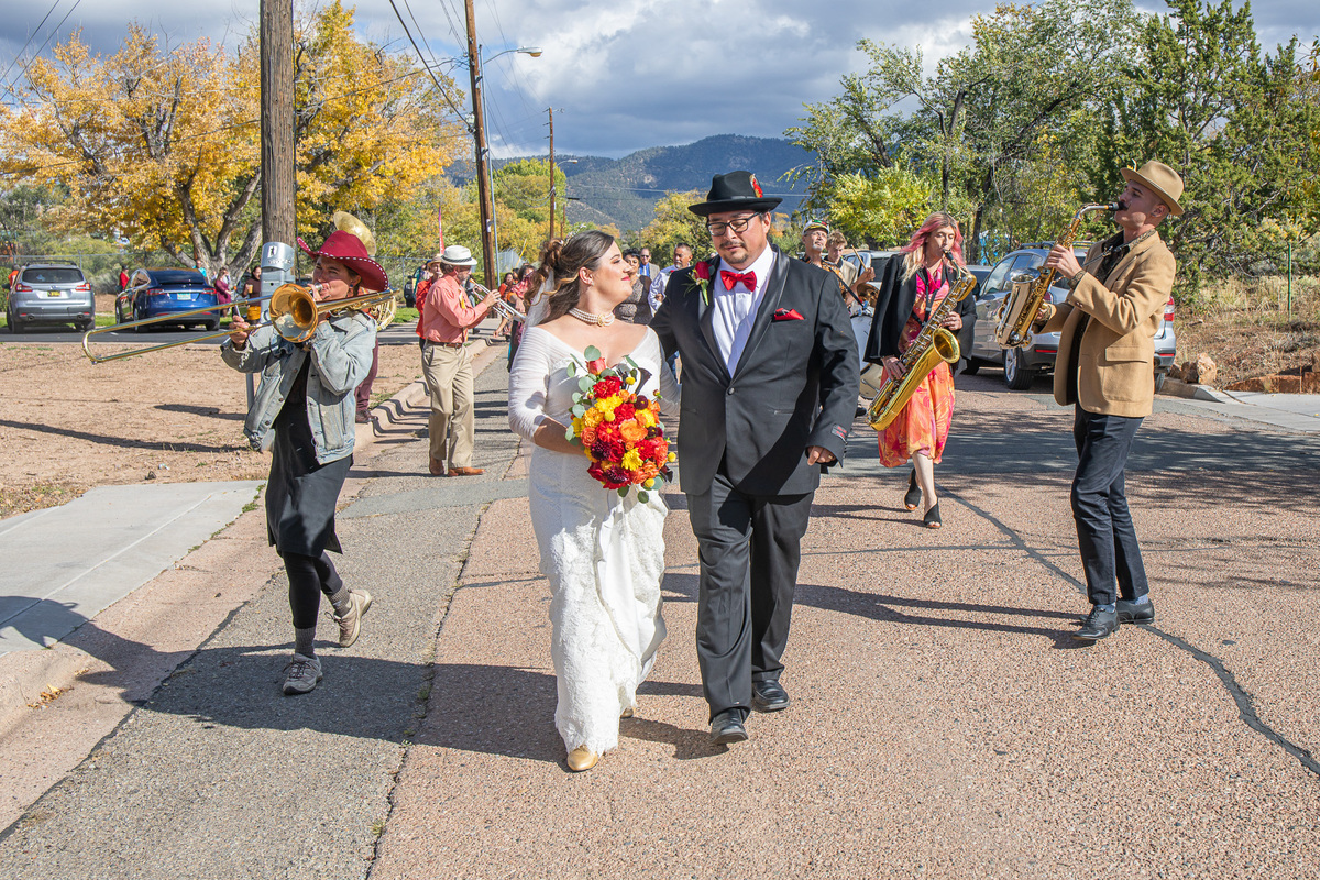 Amanda used the name Mandy until her marriage two years ago. Here, she and her husband are serenaded after their wedding ceremony in Los Alamos, New Mexico.