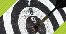 dartboard with dart in bullseye