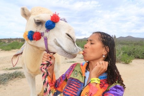 Carline Kissing &ldquo;Powder&rdquo; the camel